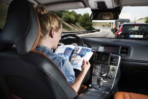 reading a book behind the wheel