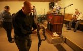 Pastor Jamie Coots in a snake handling service at his church