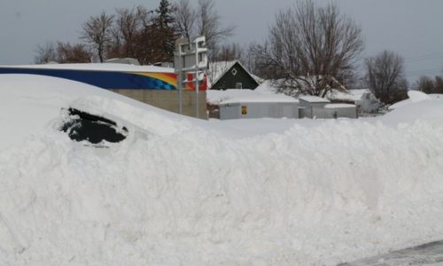 car buried in snow